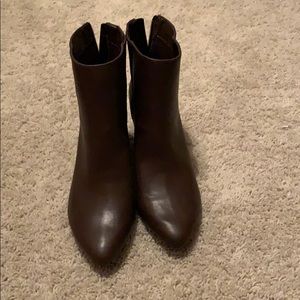 Small brown boots with heal.